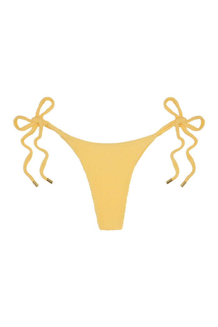 Yellow textured tie-side bikini bottom with ruched side ties and gold-tipped string ends, centered on white background.