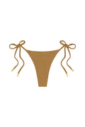 Front view of Palma thong in antique gold Lurex rib, ribbed fabric and side tie straps with gold metal tips on white background