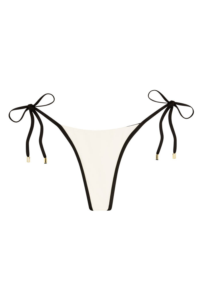 White bikini bottom with black trim and side tie straps with gold aglets