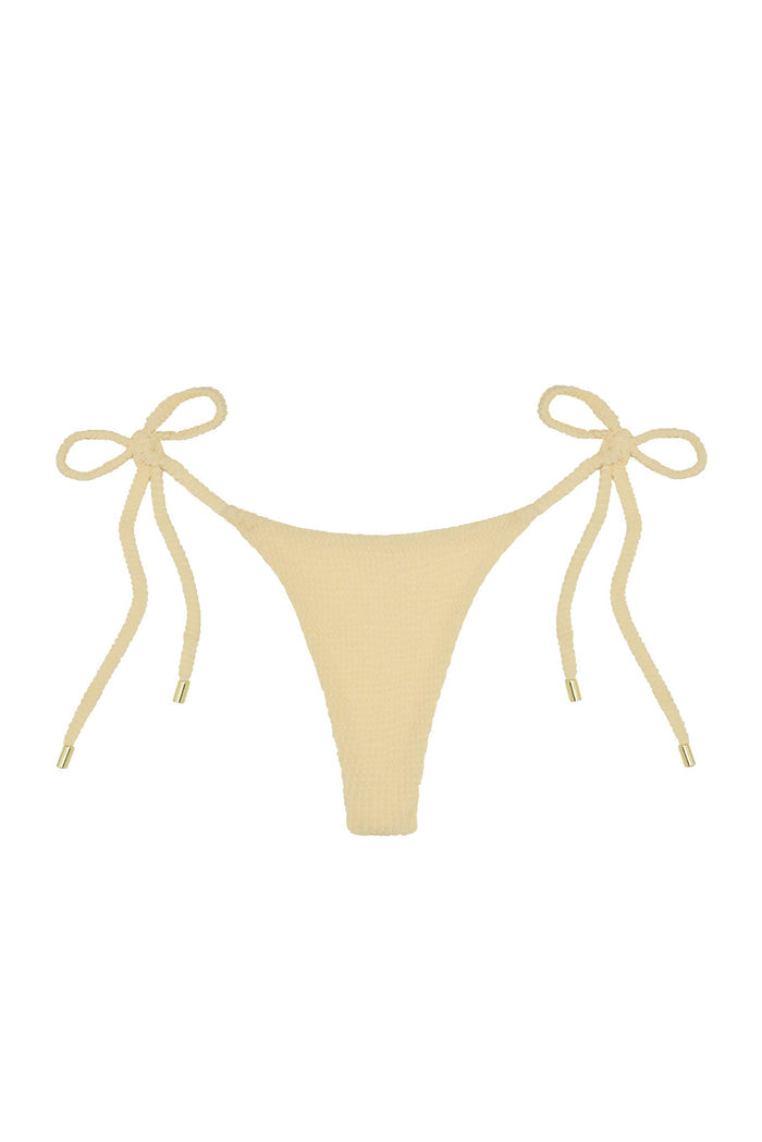 Front view of Palma thong in raffia crinkle showcasing textured crinkle fabric and adjustable side ties on white background