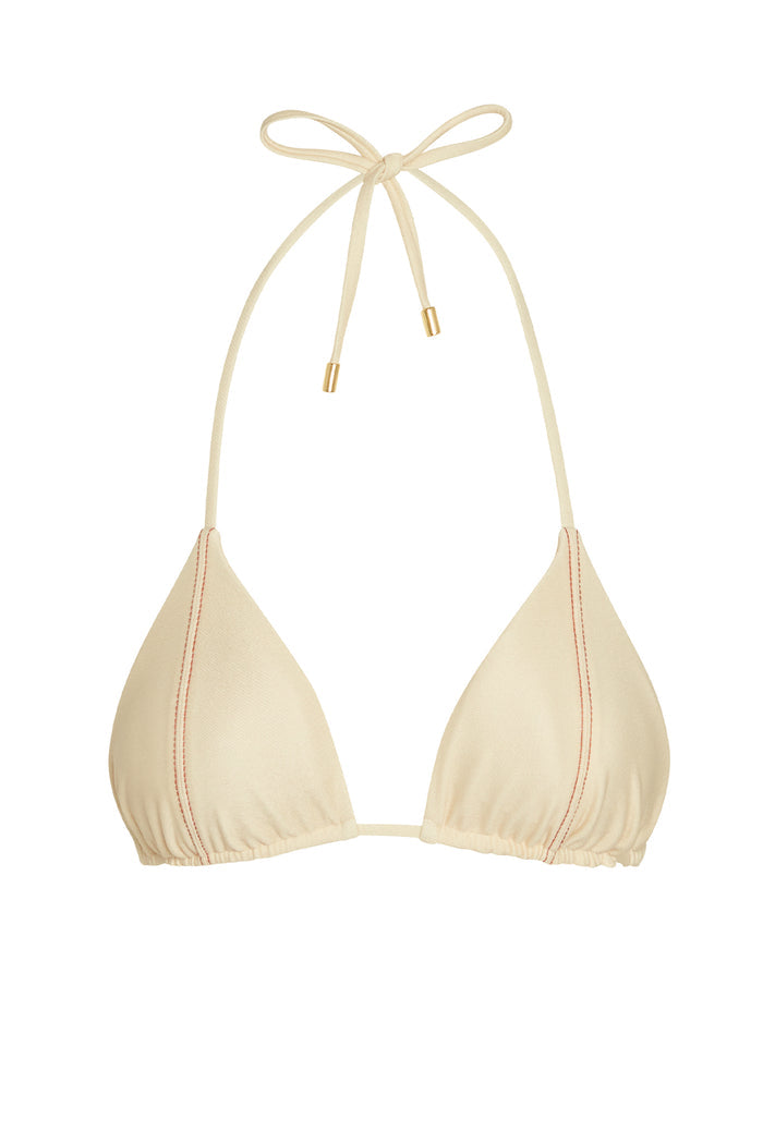 Front of Palma triangle halter top in champagne with ruched underband, center seam and gold-tipped ties on white