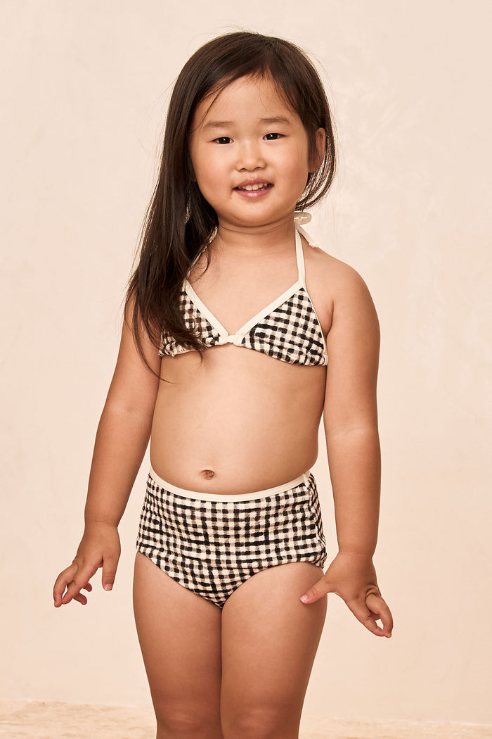 Front view of Palma top and Seychelles bottom set in black gingham showing triangle halter top with ties and high-rise bottoms