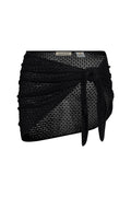 Front view of Paris sarong in black lace crochet showcasing a side tie knot and ruched wrap detail on a white background