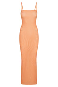 Front view of Provence Dress micro geo mesh slip with thin straps and orange micro-geo pattern on white background