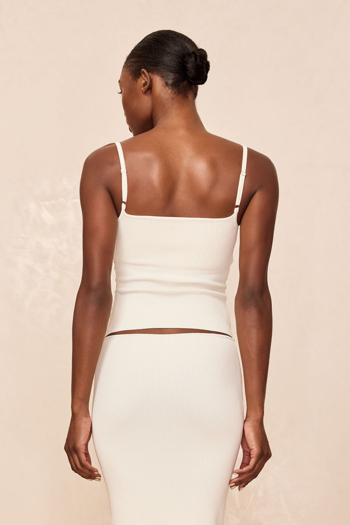 Back view of Provence Top in ivory knit rib showing square back, adjustable straps, and fitted silhouette