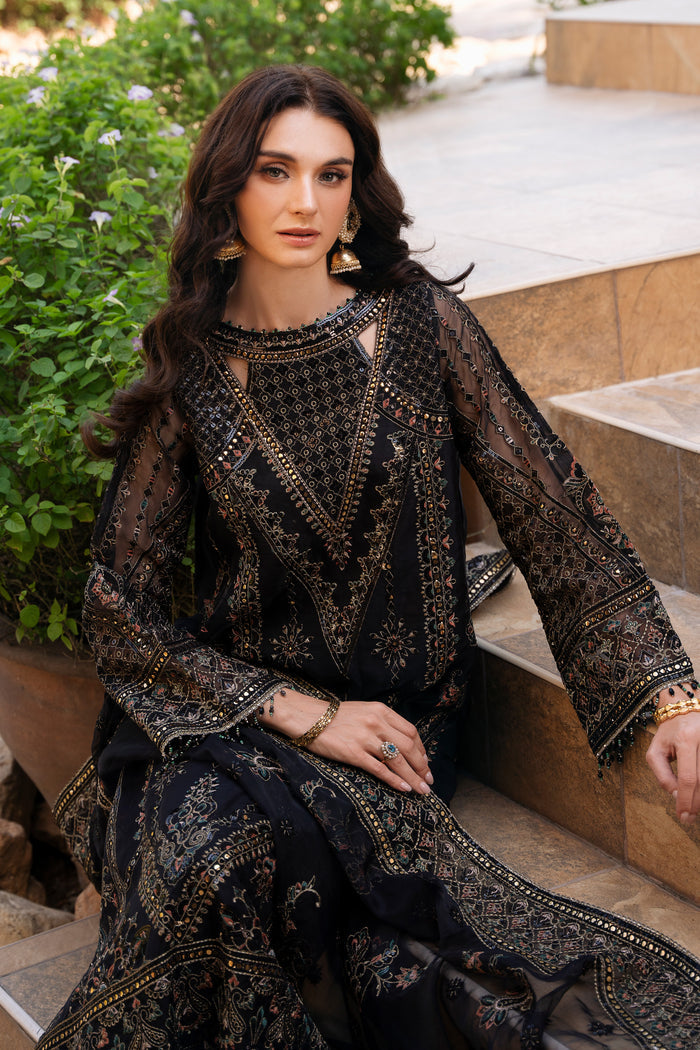 Close view of NAQSHI Qirat black shirt showing stylized neckline, sequin embroidery, Tilla work, and crystal hanging borders.