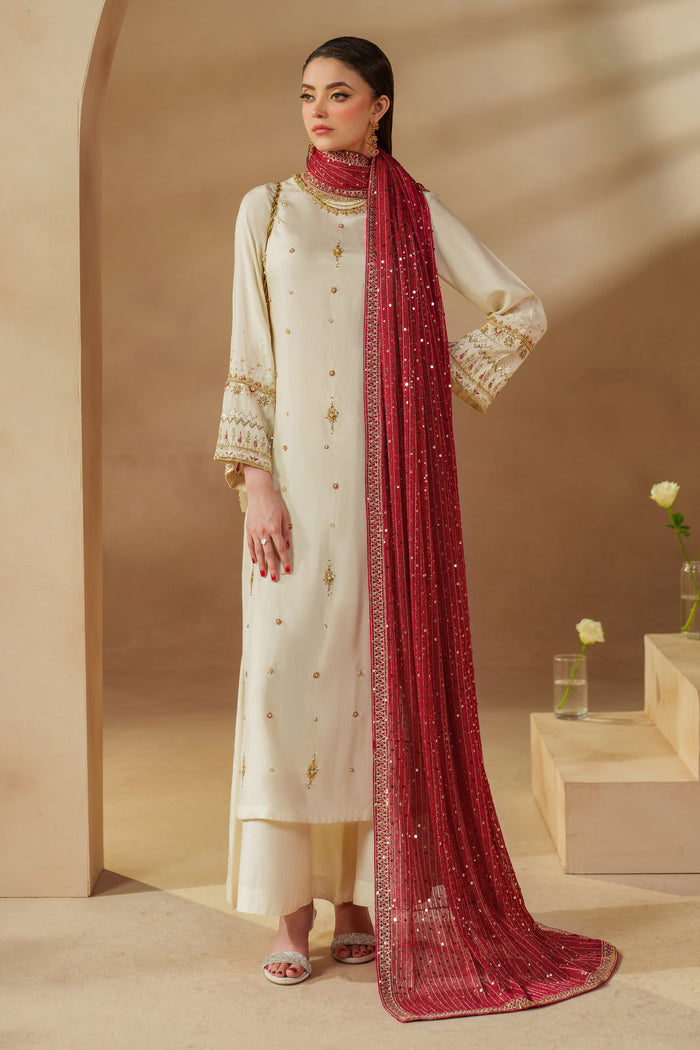 Front angle of NAQSHI Rabeel off-white luxury pret outfit showing detailed embroidery and elegant silhouette for weddings and evening celebrations
