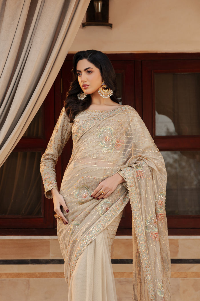 Close‑up of NAQSHI Ramish blouse boat neckline adorned with hand‑embroidered kora, dabka, sitara, stones, crystals and threadwork
