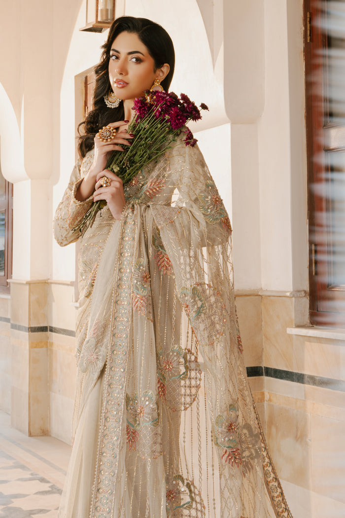 Close‑up of NAQSHI Ramish saree border with line embroidery, subtle sequin play and finely finished minimal lace edge
