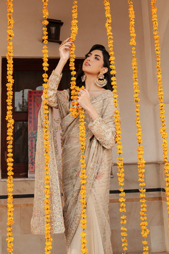 Close‑up of NAQSHI Ramish saree border with line embroidery, subtle sequin play and finely finished minimal lace edge