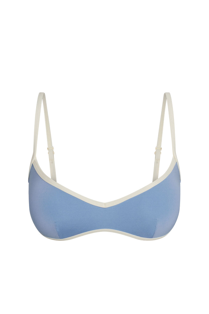 Front of Ravello Top in azure and ivory with V neckline, contrast ivory trim, adjustable straps on white background