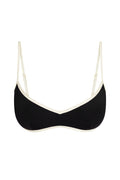 Front view of Ravello Top in black and ivory with V-neckline, contrast ivory trim and adjustable straps on white background