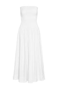 Front view of Rio Dress in white showcasing strapless smocked bodice and gathered maxi skirt on plain background