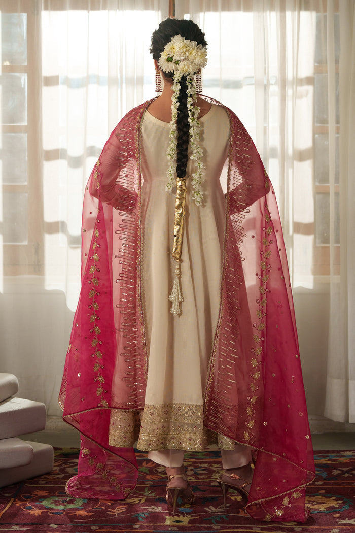 Back view of NAQSHI Rumi frock offering clean straight cutline in viscose Masoori with subtle adda embroidery at nape