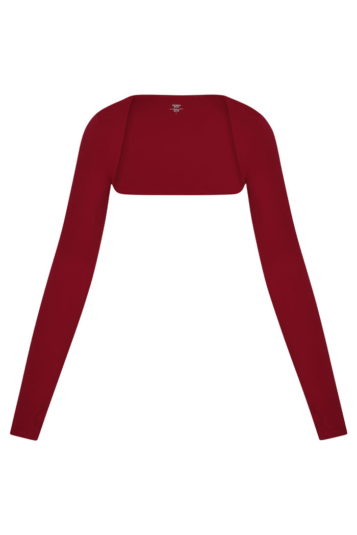 Front view of Runyon Canyon Bolero in cherry showing cropped fitted body and long sleeves with thumb holes on white background