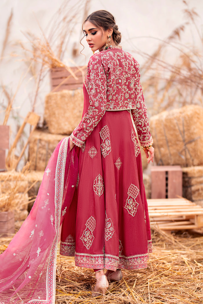 Macro of Naqshi Samar jacket embroidery highlighting dense naqshi dabka, sitaree, cora, crystals and floral motifs on carrot raw‑silk fabric.