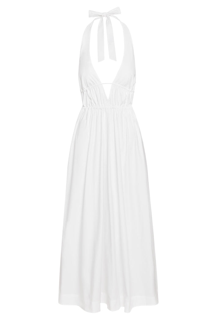 Front of Santa Cruz Dress in white with plunging halter V-neck, elastic underbust and ankle-length skirt on white background