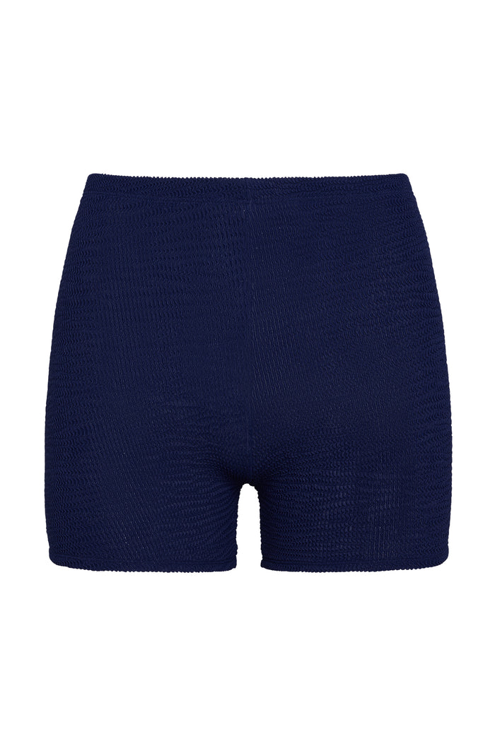 Front view of Santa Cruz Short in Midnight Crinkle showcasing high-rise smocked texture and short inseam on white background