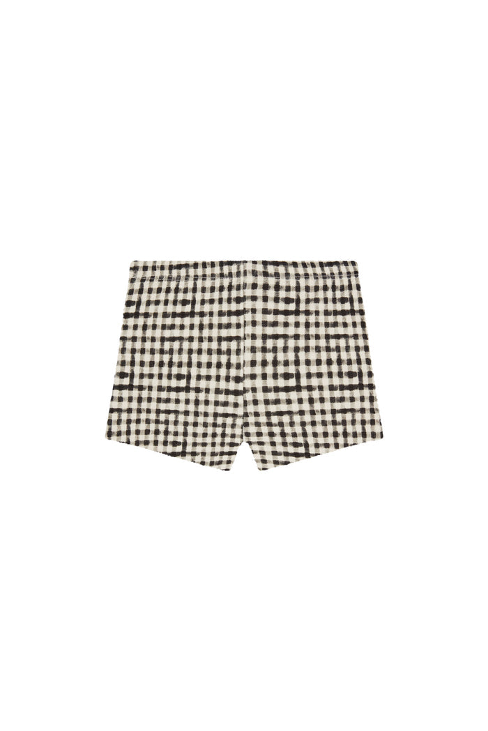 Front flat lay of Santa Cruz Short Kids shorts showing black gingham check, elastic waist, and lining on white background