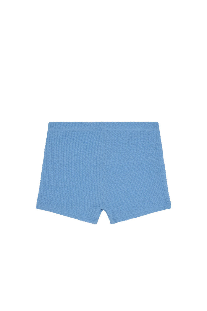 Front view of Santa Cruz kids' swim shorts in Azure Crinkle showing crinkled texture and elastic waist on white background