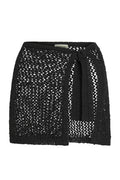 Front view of Santa Marta Sarong in black showing open-weave crochet, side wrap tie, unlined sheer finish on white background