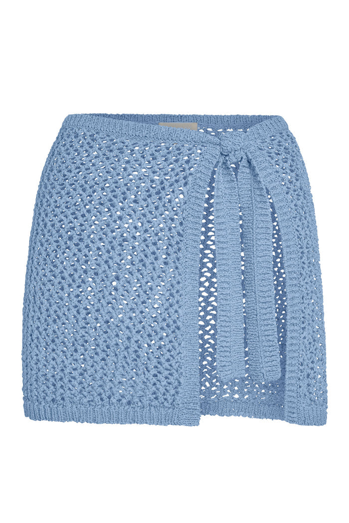 Front view of Santa Marta Sarong in Sky Petit Crochet with open-knit crochet fabric and wrap-tie on white background