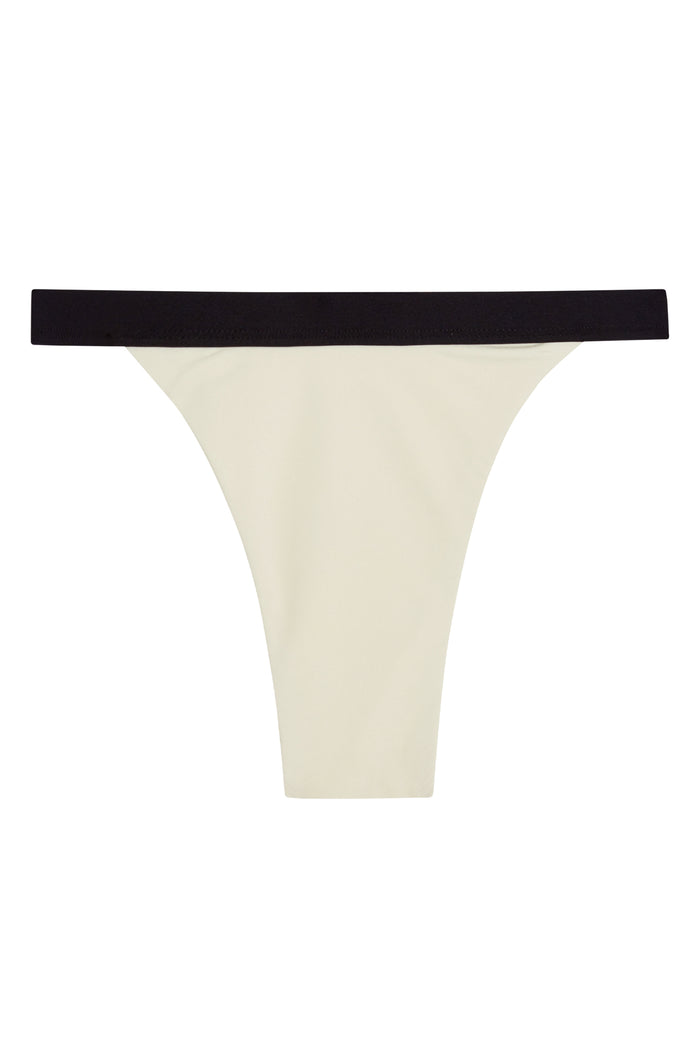 Flat-lay of Santorini Bottom in ivory with black waistband showing high-cut mid-waist thong on white background