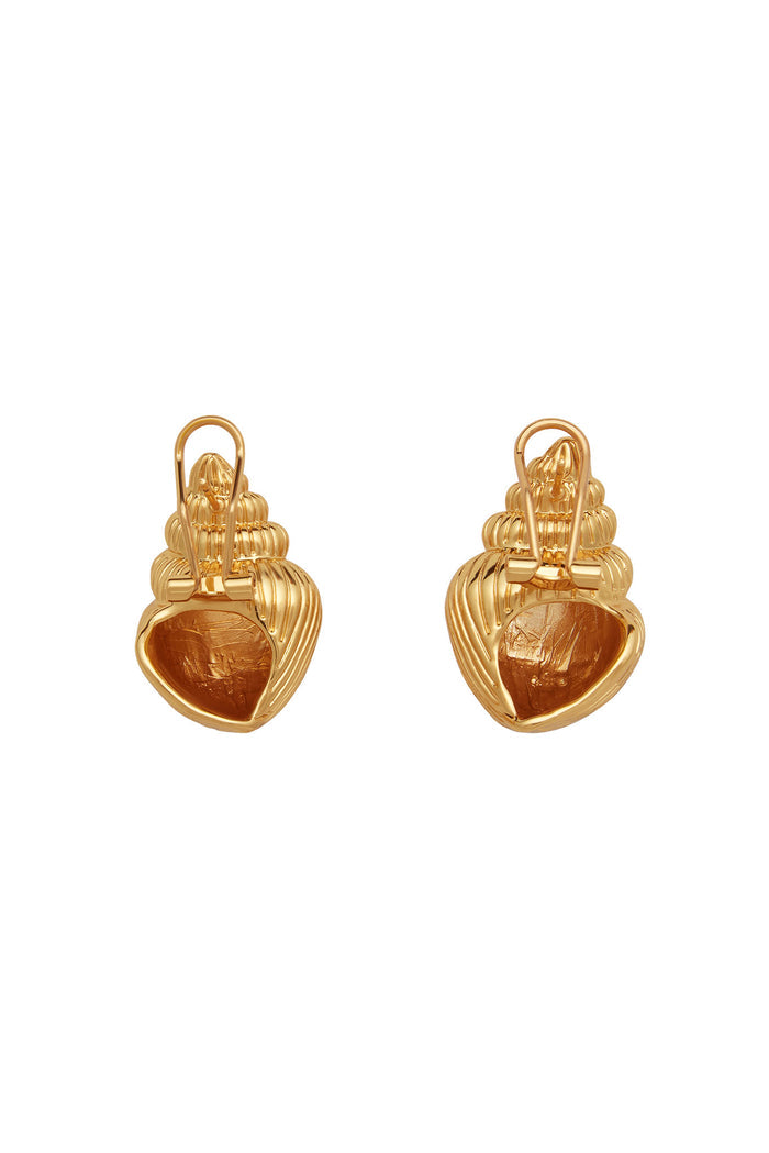 Gold seashell-shaped clip-on earrings, pair on white background.