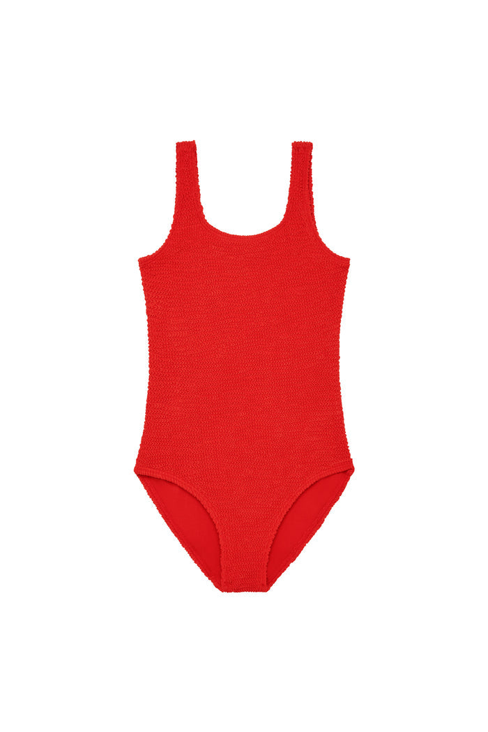 Red textured one-piece swimsuit with scoop neck, laid flat on white background.