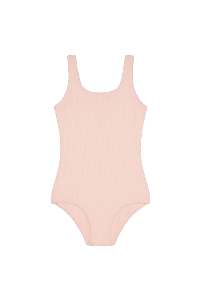 Front flat lay of Sardinia one-piece kids swimsuit in Powder Pink Crinkle showing scoop neckline and textured crinkle fabric on white background
