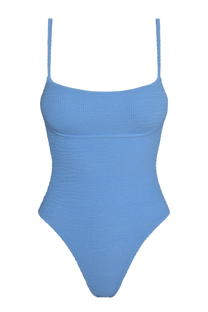 Front view of Sausalito One Piece Long swimsuit in Azure with scoop neckline, thin adjustable straps, high-leg cheeky cut, textured smocked fabric on white background