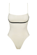 Women's one-piece cream swimsuit with thin spaghetti straps and black underbust trim
