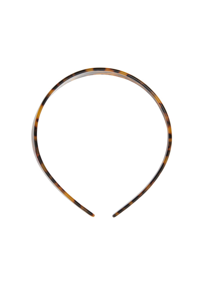 Thin tortoiseshell plastic headband with brown and black mottled pattern