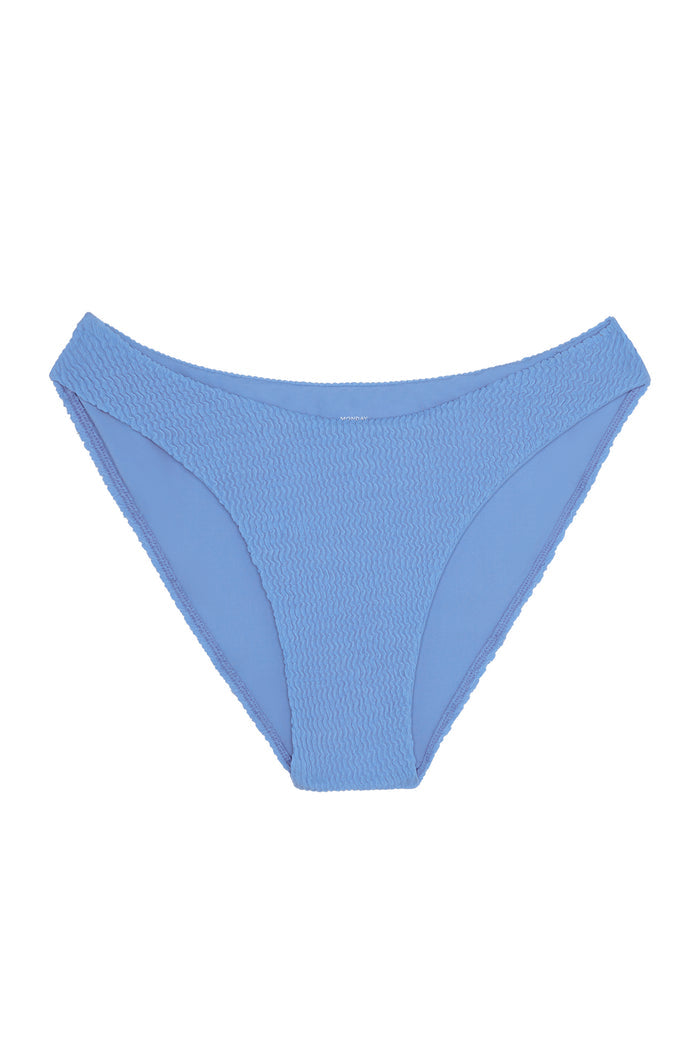 Light blue textured bikini bottoms with high-cut sides; MONDAY logo on inner waistband.