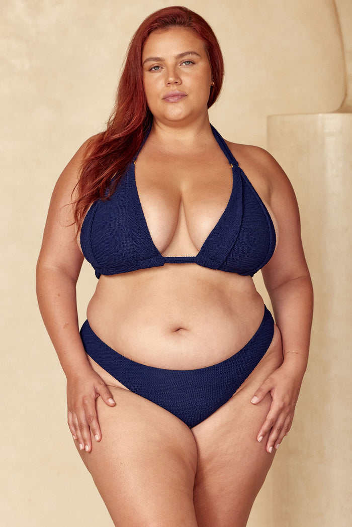 Front view of Seychelles Bottom in Midnight Crinkle modest coverage on a plus-size model against a neutral backdrop