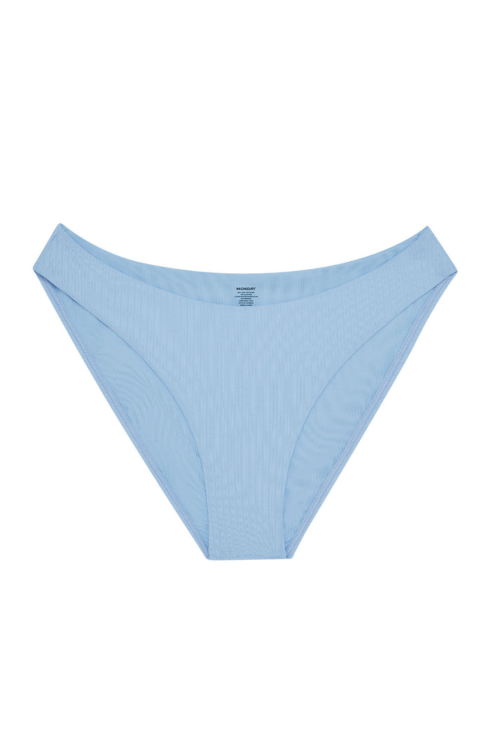 Front view of Seychelles bikini bottom in sky rib fabric showing mid-rise coverage and high-cut leg on white background