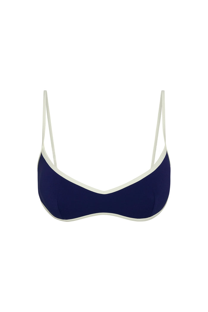 Front view of Soho Bra in midnight with ivory contrast trim, V neckline and thin adjustable straps on white background