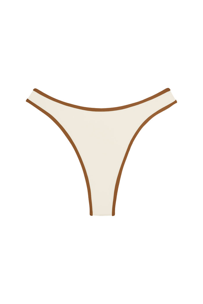 Front of Somerset bottom in ivory with caramel trim showing high-cut thong silhouette on white background