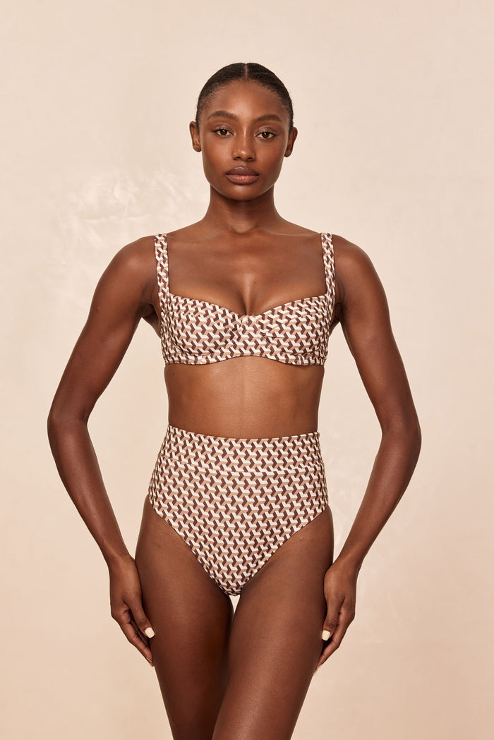 Front view of Sorrento Top with high-waist bottoms in Husk Geo print, showing brown and cream geometric pattern on beige background