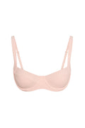 Front view of Sorrento Top in powder pink rib with underwire cups, ribbed fabric and adjustable straps on white background