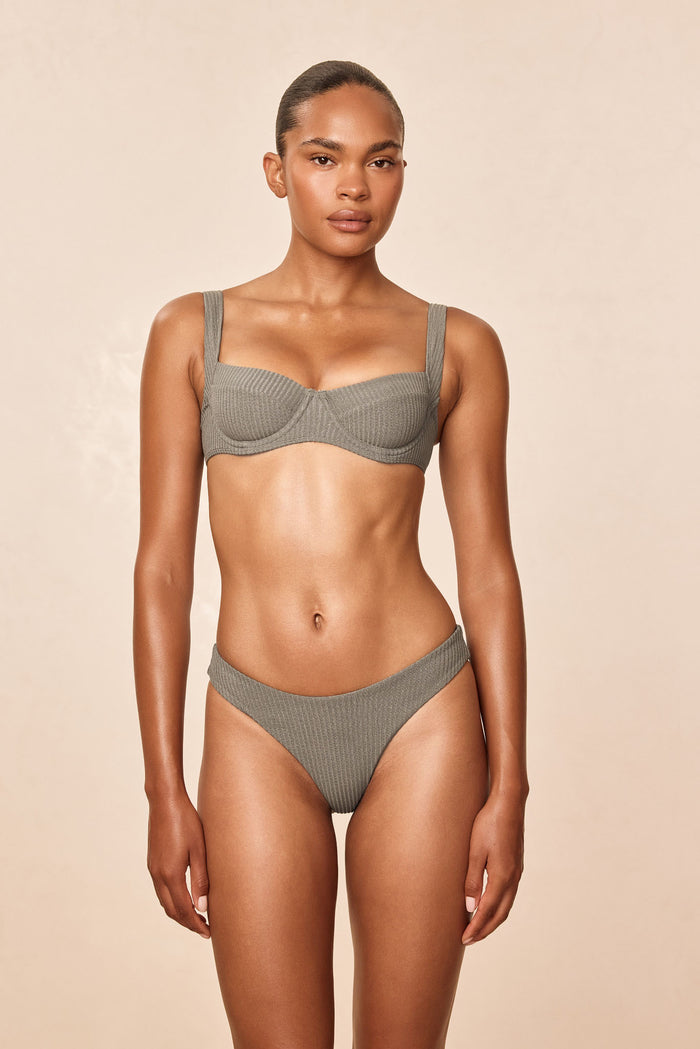 Front view of Sorrento Top in Steel Lurex Rib showing demi underwire cups, adjustable shoulder straps and ribbed lurex texture on a beige studio background