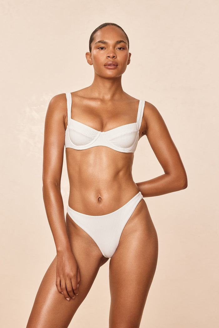 Front view of Sorrento Top White Rib showing underwire demi cups, adjustable straps and ribbed fabric on model