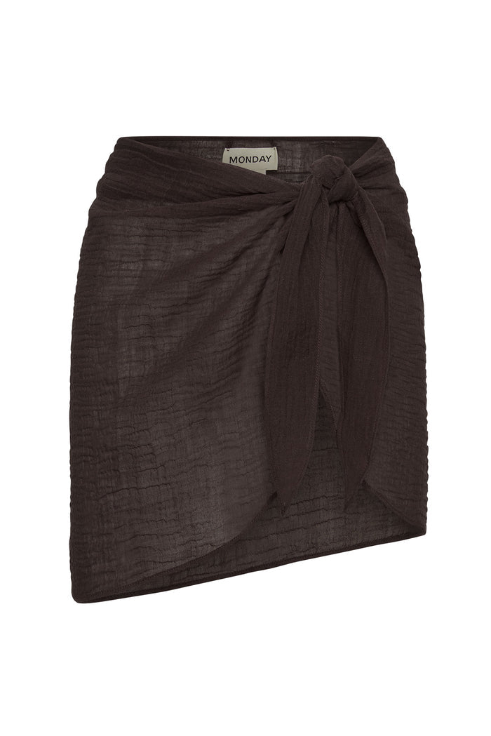 Front view of South Beach Sarong in espresso crinkle linen, wrap mini with front knot and visible MONDAY label