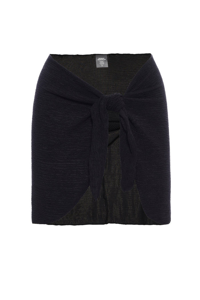 Front flat-lay of St. Barth's Skirt in black crinkle showcasing knotted front tie and textured fabric on white background