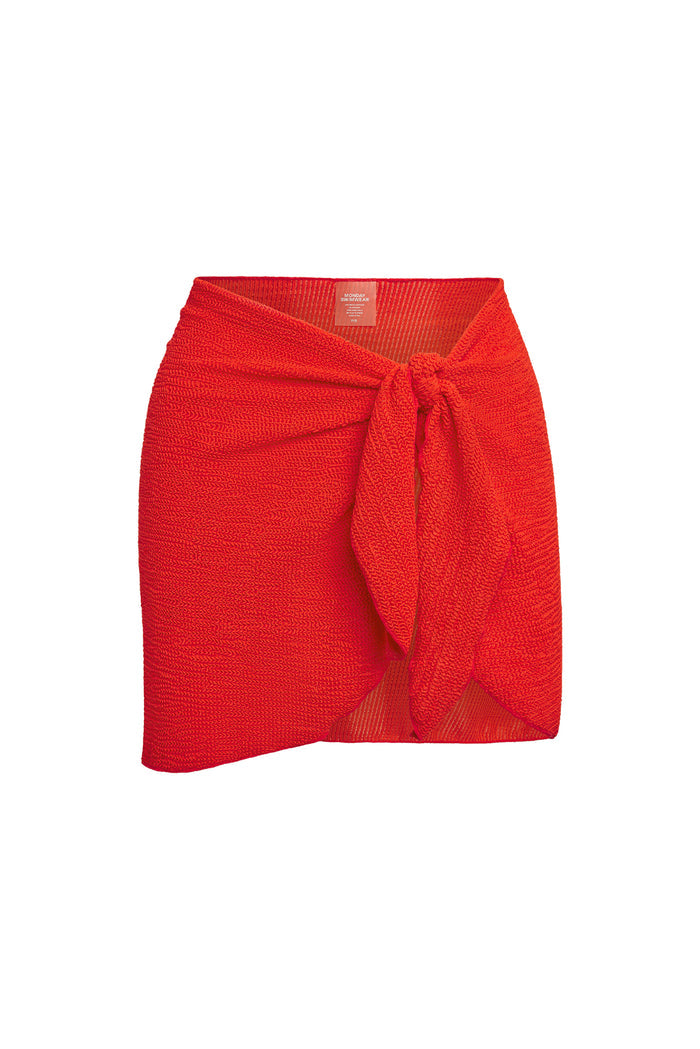 Front of St. Barth’s Skirt in Chili Pepper Crinkle showing crinkled knit texture and front tie on white background