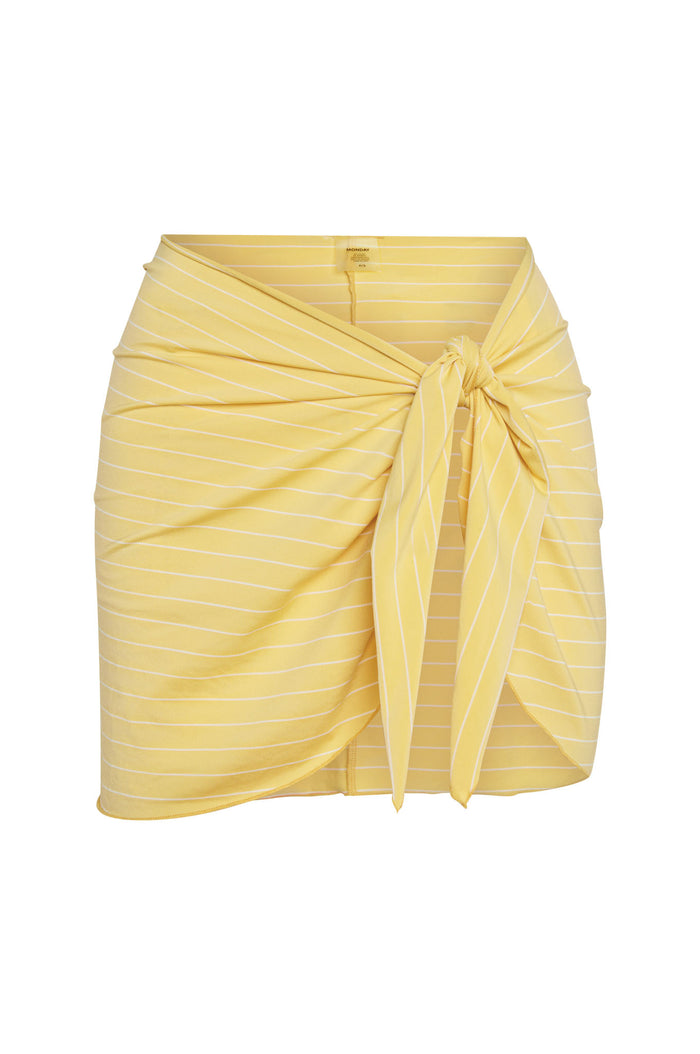 Front of St. Barth’s Meyer Stripe skirt showing tied wrap front, short length, and yellow stripe pattern on white background