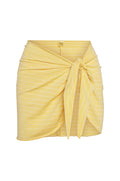 Front of St. Barth’s Meyer Stripe skirt showing tied wrap front, short length, and yellow stripe pattern on white background