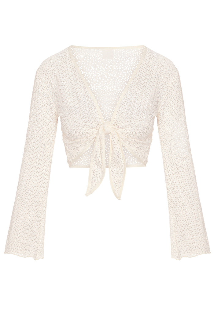 Front view of St. Barth's top in ivory crochet, tie-front cropped knit with long bell sleeves on white background