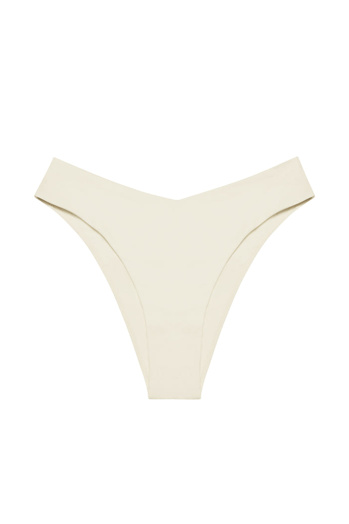 Front view of St. Lucia Bottom swimwear in ivory showcasing high-leg V-front and mid-rise cut on white background