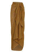 Front view of St Tropez sarong in antique gold crinkle linen tied at waist with long draped panels on white background